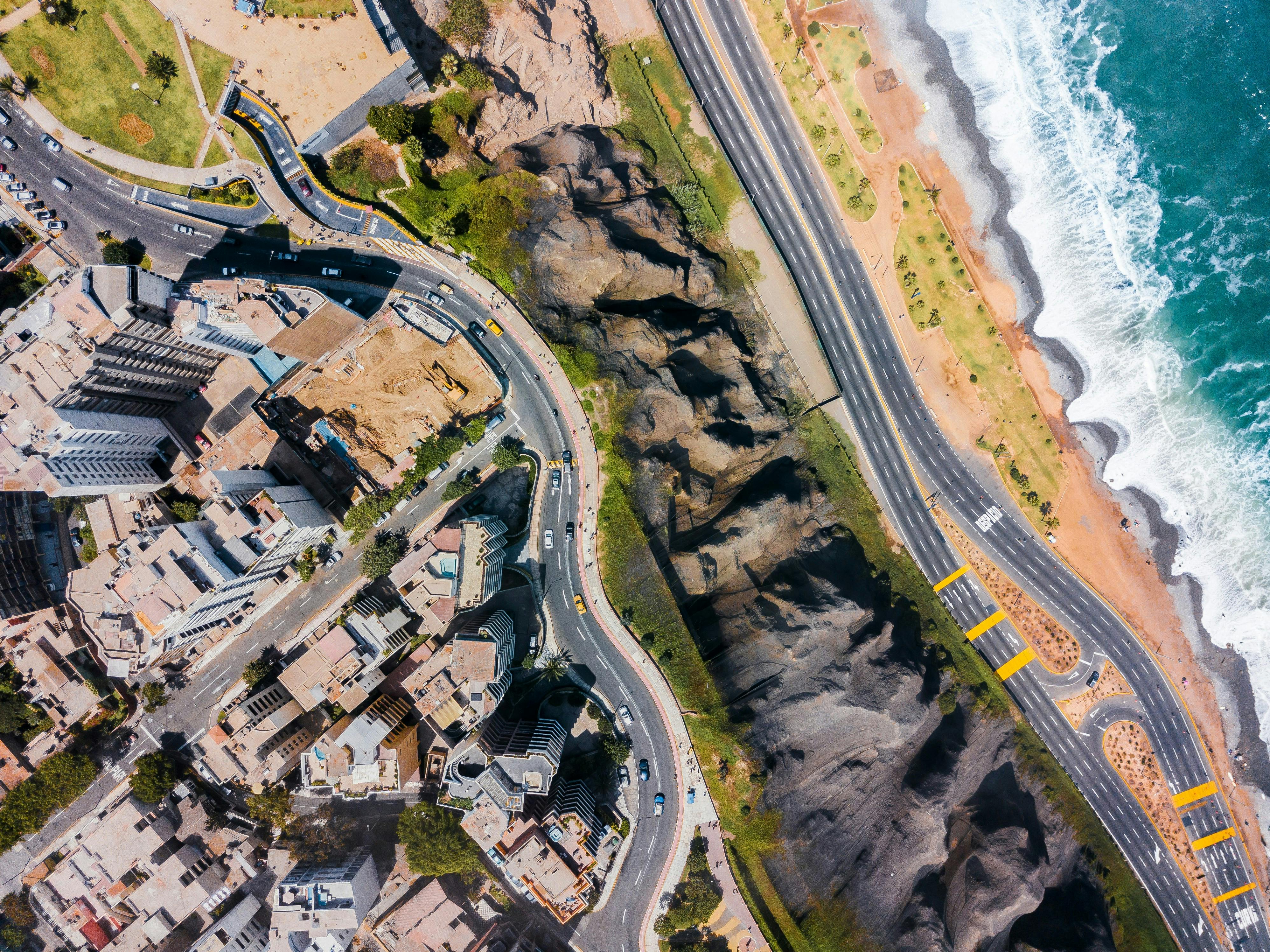 Photo by Willian Justen de Vasconcellos: https://www.pexels.com/photo/seaside-city-from-a-birds-eye-view-22484277/